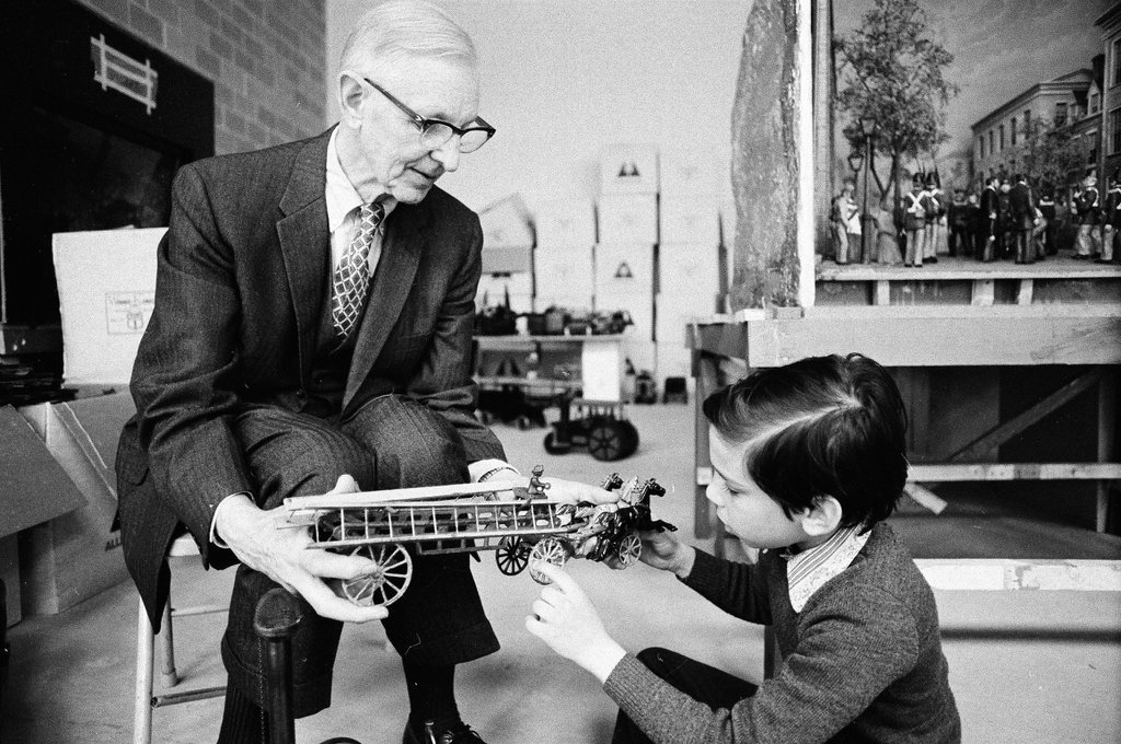 Dewey Ericsson and Rod Isaac Smilgof interact with model vehicles at the Chicago Historical Society - Jerry Tomaselli for Chicago Sun-Times