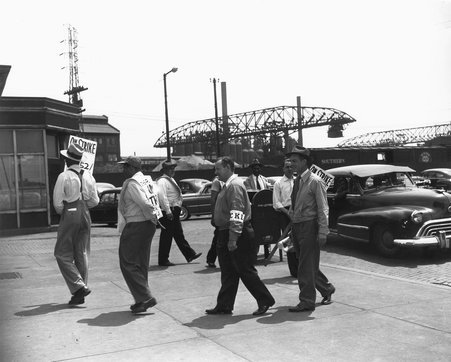 Strikers march outside the 89th Street gate of U.S. Steel's South Works - Chicago Daily News, Inc.