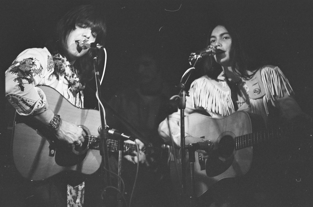 Gram Parsons and Emmylou Harris in concert - Joe Marino for Chicago Sun-Times