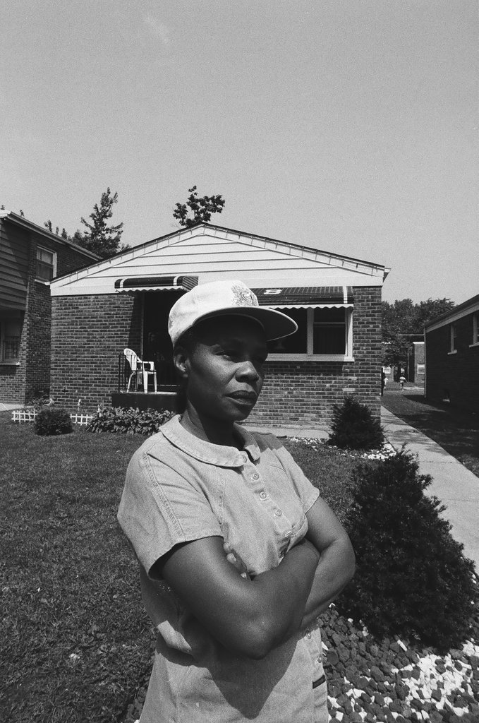 Iola Bausley poses with her home, purchased from the CHA - Chicago Sun-Times
