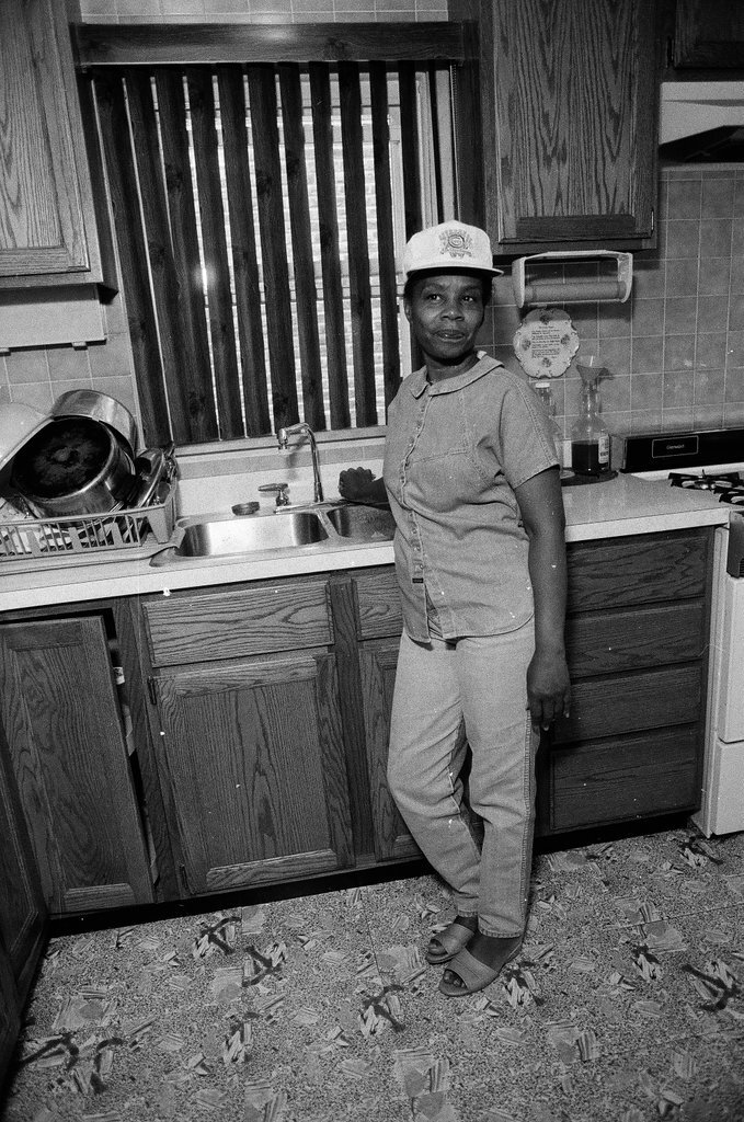 Iola Bausley poses with her home, purchased from the CHA - Chicago Sun-Times