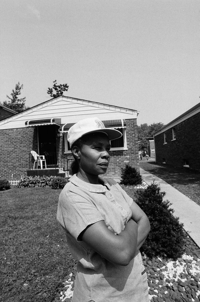 Iola Bausley poses with her home, purchased from the CHA - Chicago Sun-Times