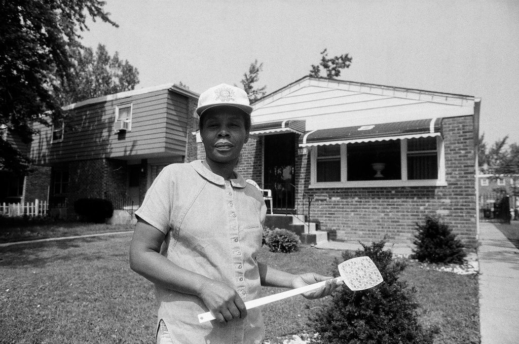 Iola Bausley poses with her home, purchased from the CHA - Chicago Sun-Times