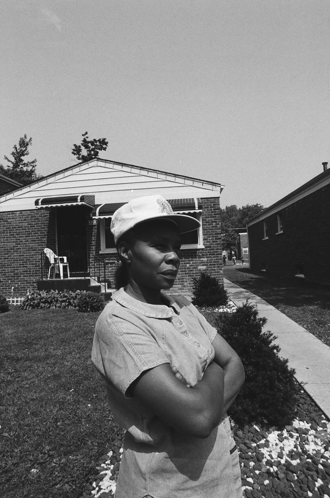 Iola Bausley poses with her home, purchased from the CHA - Chicago Sun-Times