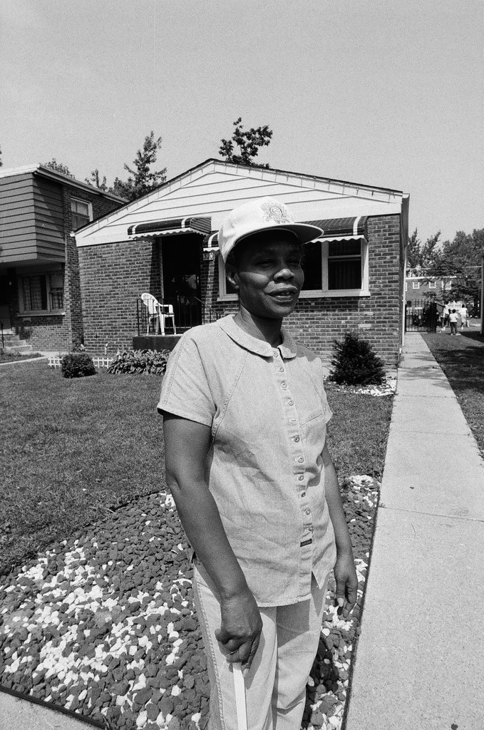 Iola Bausley poses with her home, purchased from the CHA - Chicago Sun-Times