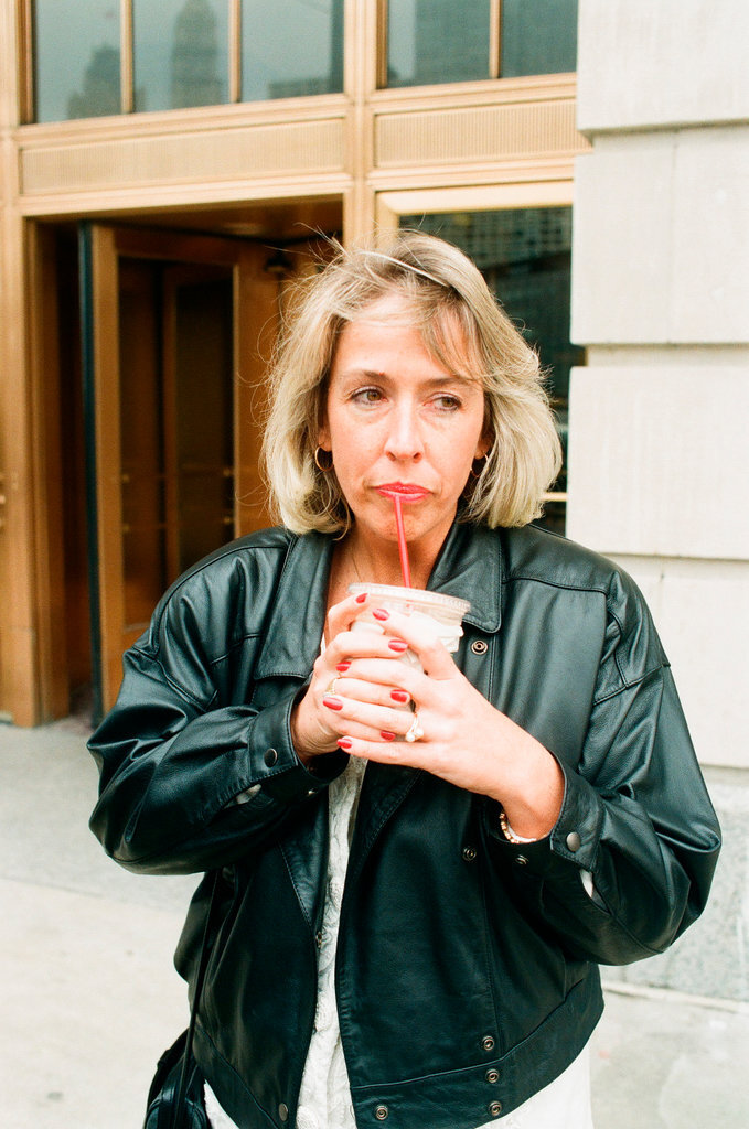 Coffee drinkers talk outside of Starbucks - Chicago Sun-Times