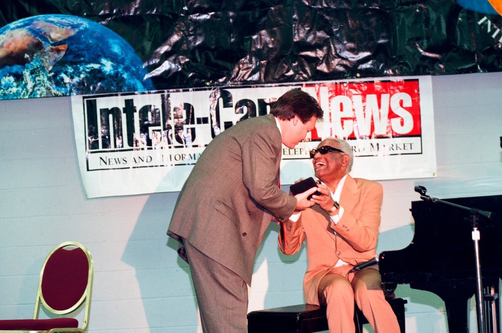 Ray Charles promoting braille phone card - Chicago Sun-Times