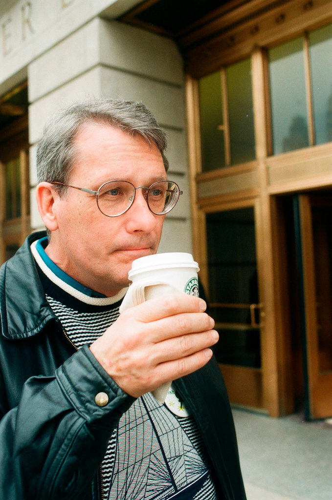 Coffee drinkers talk outside of Starbucks - Chicago Sun-Times