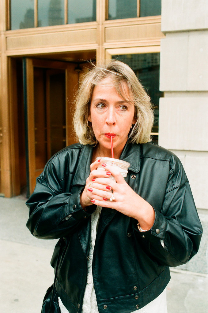 Coffee drinkers talk outside of Starbucks - Chicago Sun-Times