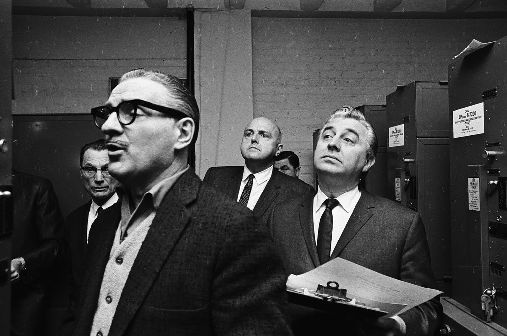John Hoellen and Roman Pucinksi watching vote recount - Chicago Sun-Times