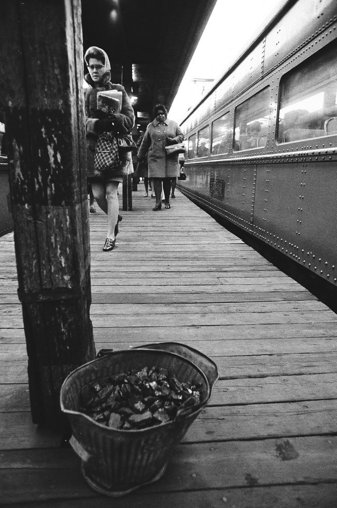 Trains and passengers at South Shore Railroad station - Chicago Sun-Times
