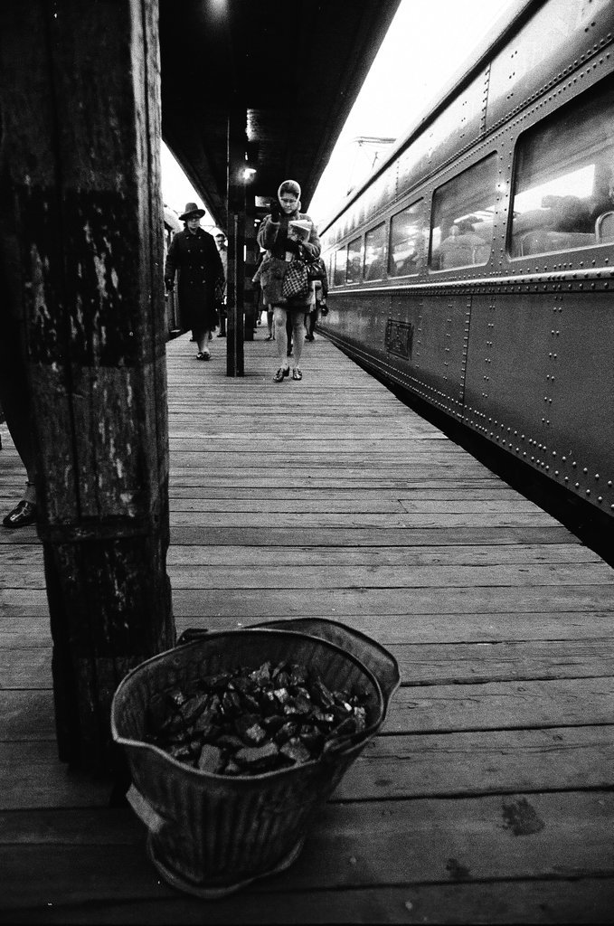 Trains and passengers at South Shore Railroad station - Chicago Sun-Times