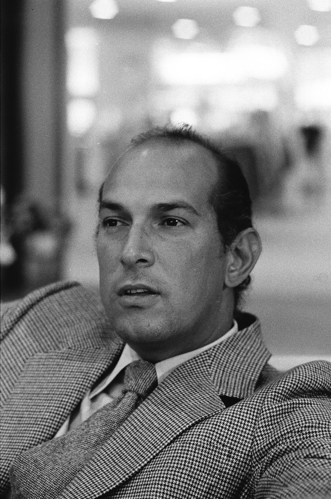 Oscar De La Renta sitting on a couch - Carmen Reporto for Chicago Sun-Times