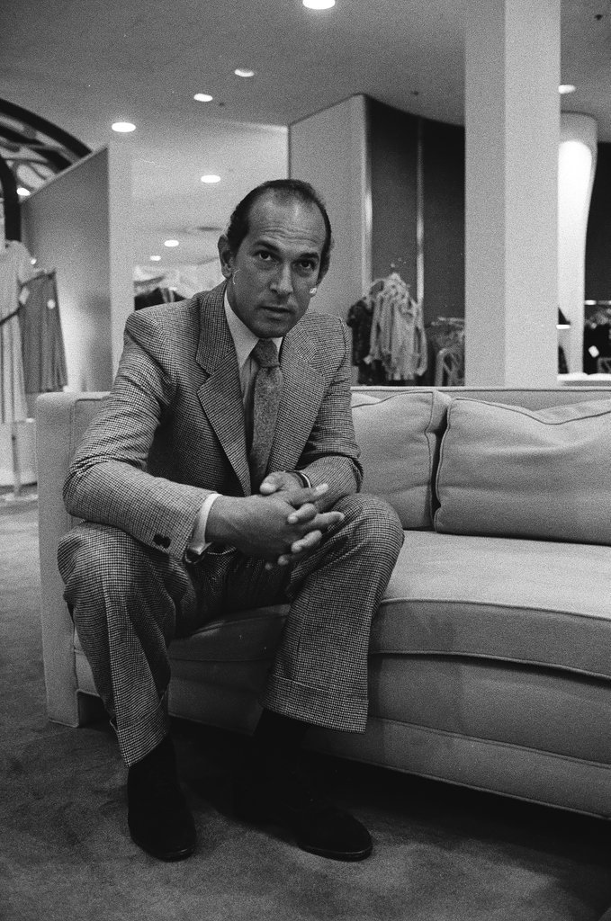 Oscar De La Renta sitting on a couch - Carmen Reporto for Chicago Sun-Times