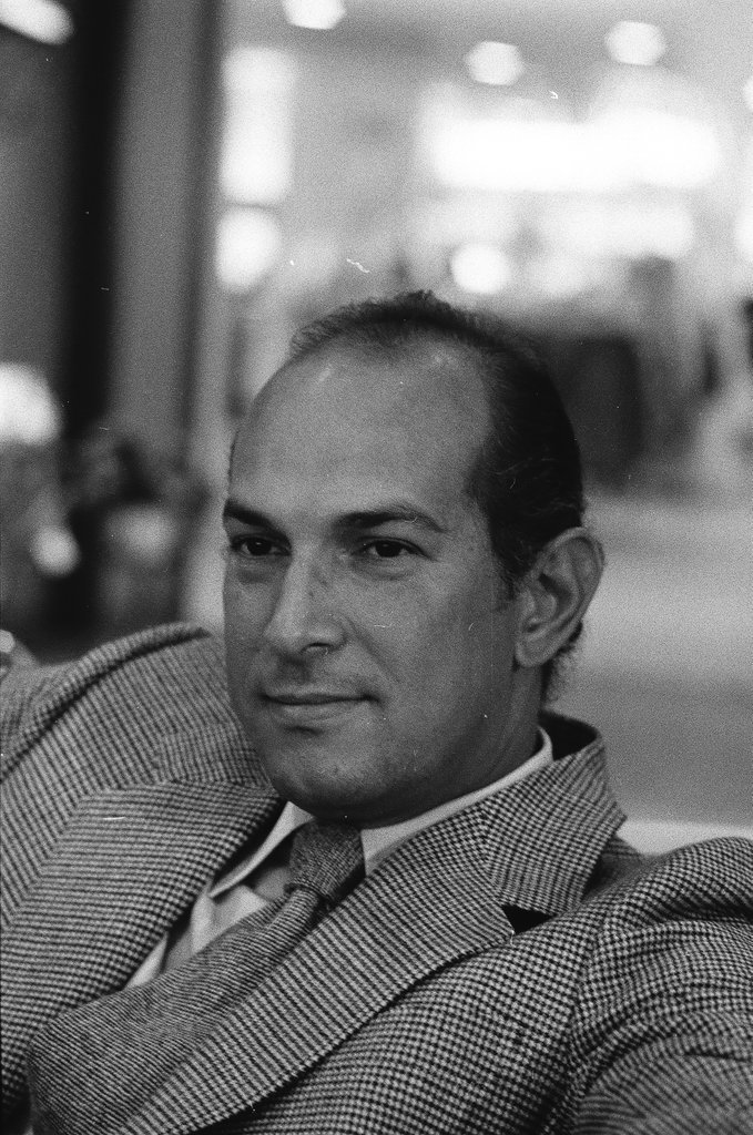 Oscar De La Renta sitting on a couch - Carmen Reporto for Chicago Sun-Times