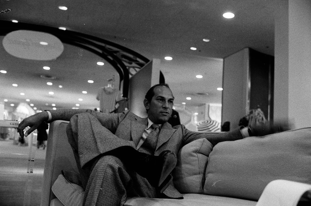 Oscar De La Renta sitting on a couch - Carmen Reporto for Chicago Sun-Times