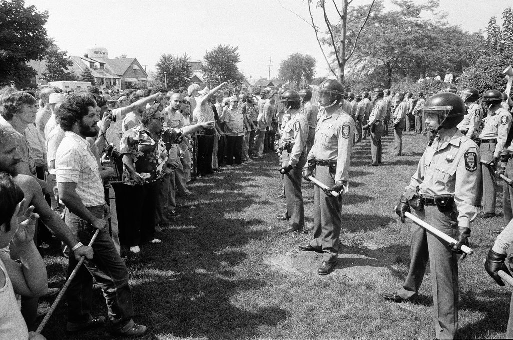 American Nazi Party members protected by line of policemen during rally - Chicago Sun-Times