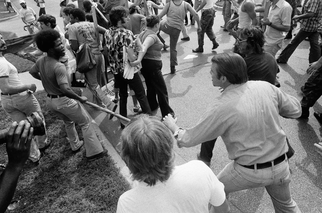 American Nazi Party members protected by line of policemen during rally - Chicago Sun-Times