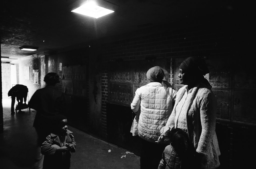 Cabrini-Green mailboxes shown in a poorly lit area - Chicago Sun-Times