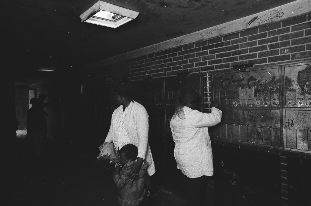 Cabrini-Green mailboxes shown in a poorly lit area - Chicago Sun-Times