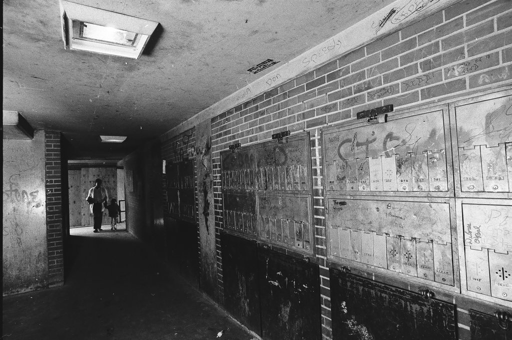 Cabrini-Green mailboxes shown in a poorly lit area - Chicago Sun-Times