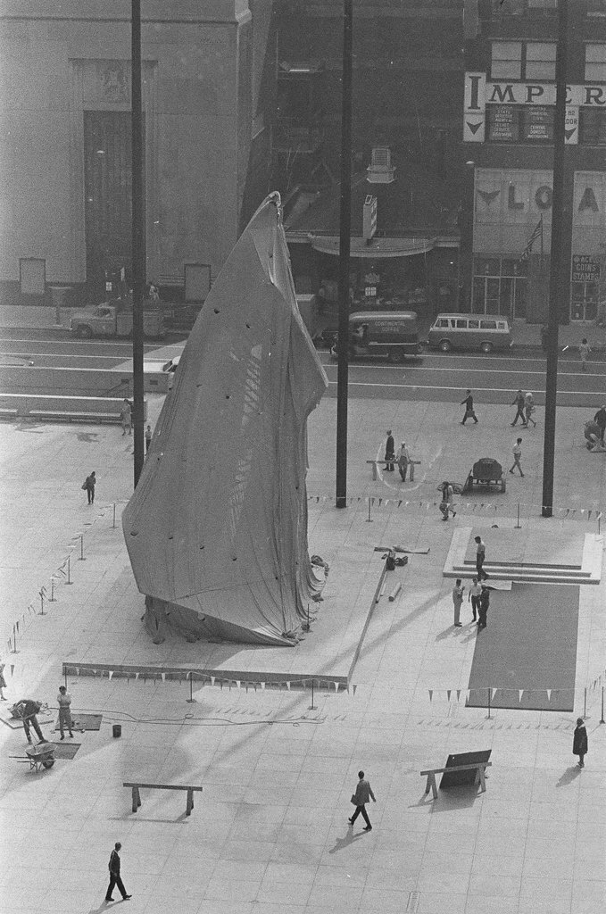 The Picasso statue being draped for the dedication ceremony - Chicago Sun-Times
