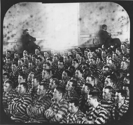 Group of imprisoned people sitting in church chapel service - Wetmore, S. W. (Sidney W.)