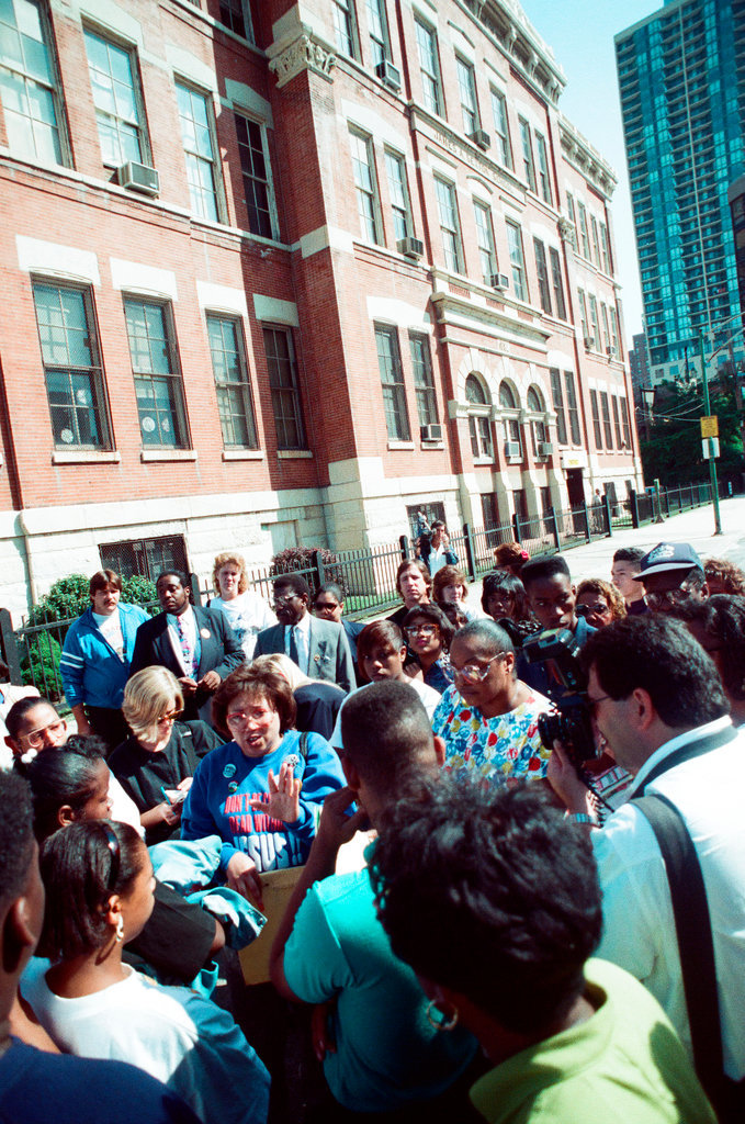 Members of the Parents Coalition protest the closing of Metro High School - Chicago Sun-Times