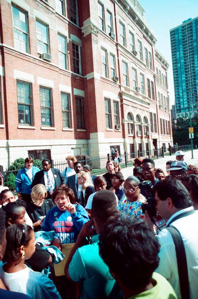 Members of the Parents Coalition protest the closing of Metro High School - Chicago Sun-Times