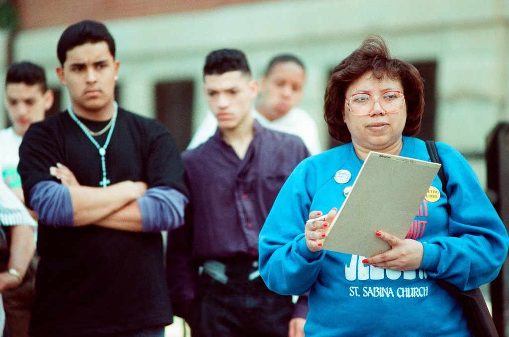 Members of the Parents Coalition protest the closing of Metro High School - Chicago Sun-Times