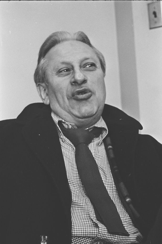 Author and broadcaster Studs Terkel gets interviewed while getting photos taken - Charles Krejcsi for Chicago Sun-Times