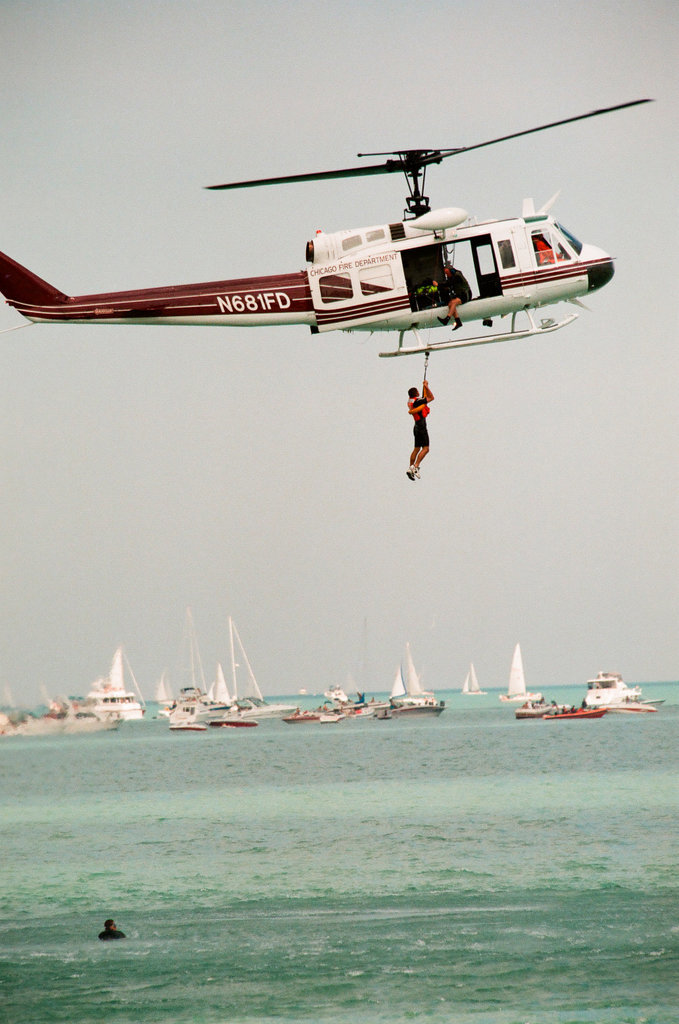 Crowds watch planes, helicopters, and water sports performances at the 1997 Air and Water Show - Chicago Sun-Times