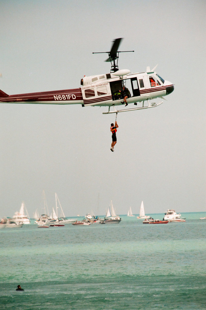 Crowds watch planes, helicopters, and water sports performances at the 1997 Air and Water Show - Chicago Sun-Times