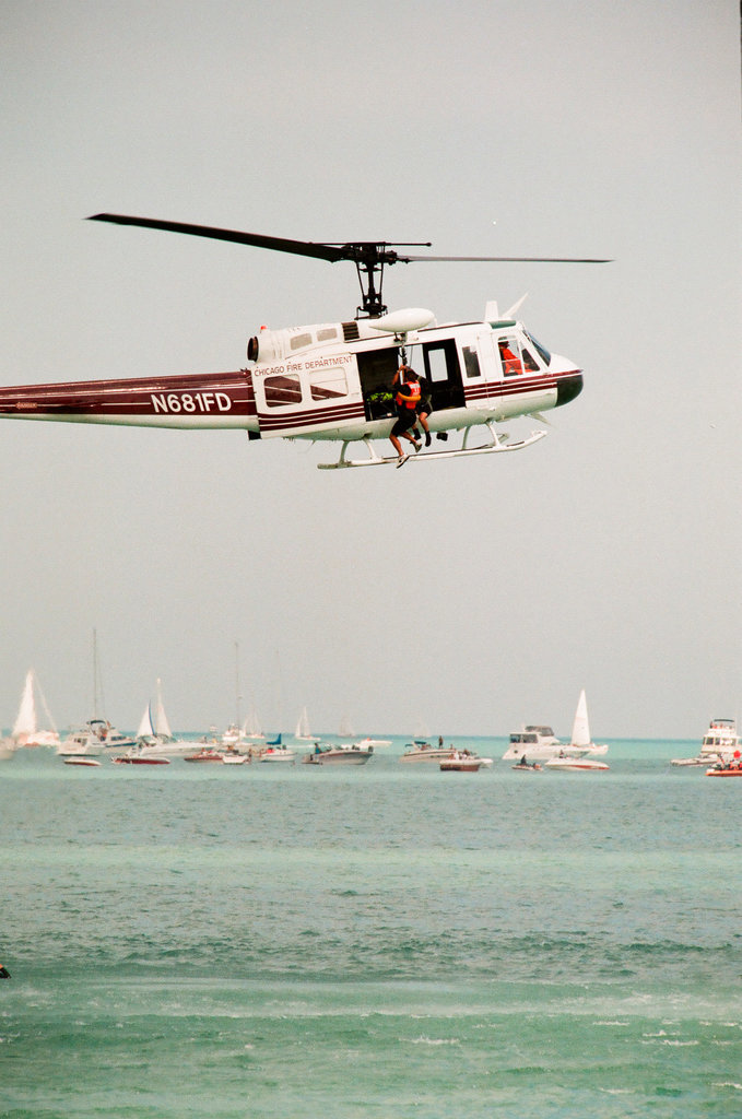 Crowds watch planes, helicopters, and water sports performances at the 1997 Air and Water Show - Chicago Sun-Times