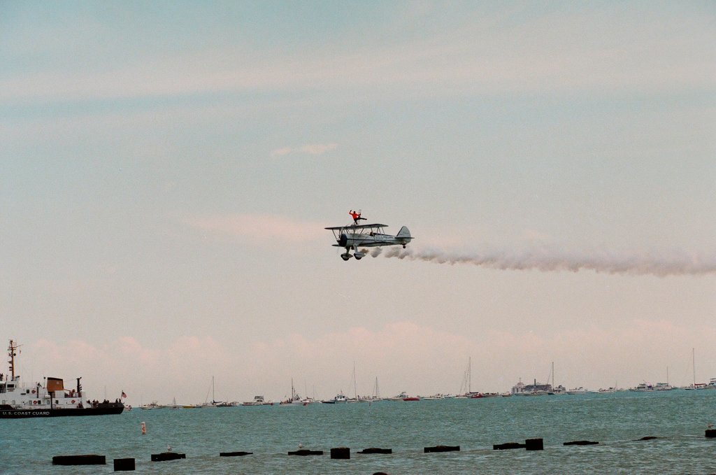 Crowds watch planes, helicopters, and water sports performances at the 1997 Air and Water Show - Chicago Sun-Times