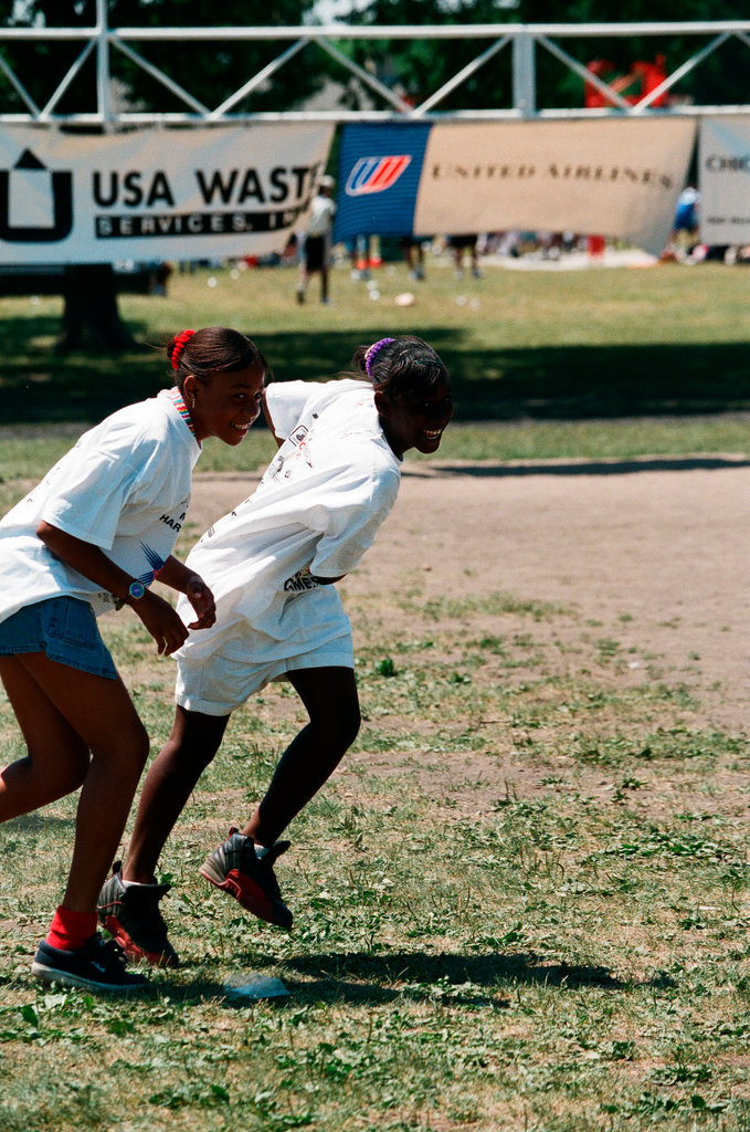 Children and young adults participate in a free football camp at Marquette Park - Chicago Sun-Times
