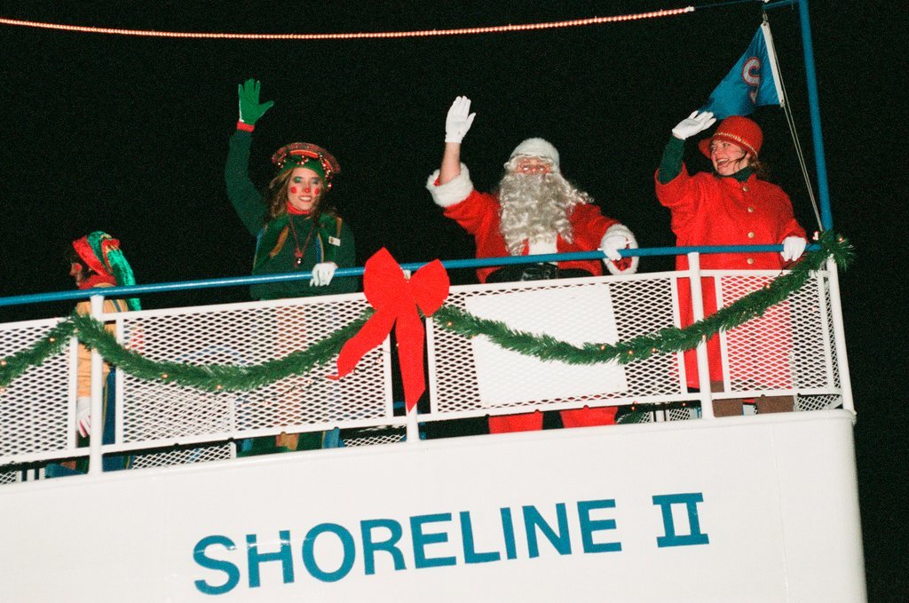Santa Claus arrives at Navy Pier aboard a boat for the Holiday Light Up Ceremony - Chicago Sun-Times