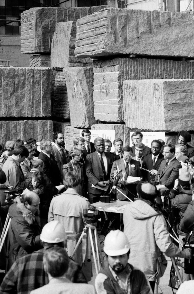 Mayor Harold Washington speaks at a construction site with Ernest Morial - Chicago Sun-Times