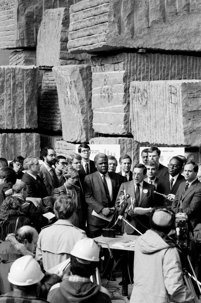 Mayor Harold Washington speaks at a construction site with Ernest Morial - Chicago Sun-Times
