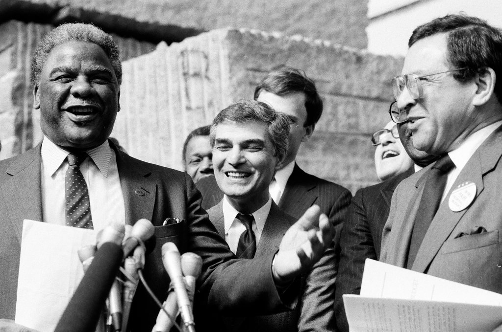 Mayor Harold Washington speaks at a construction site with Ernest Morial - Chicago Sun-Times