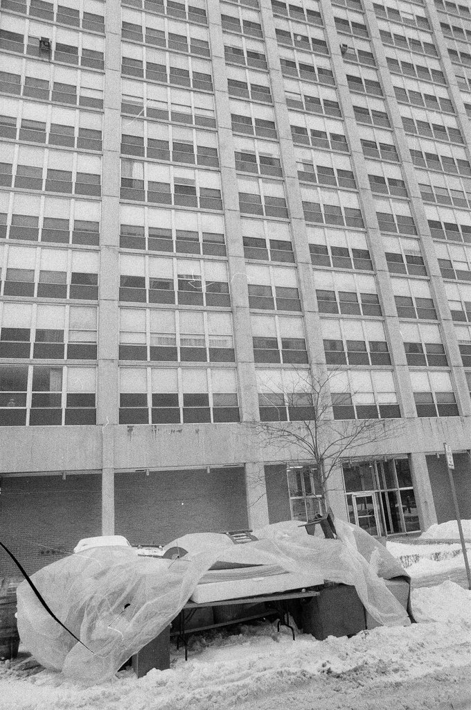 Furniture sits outside of a building that was served an eviction notice - Chuck (Charles) Kirman for Chicago Sun-Times