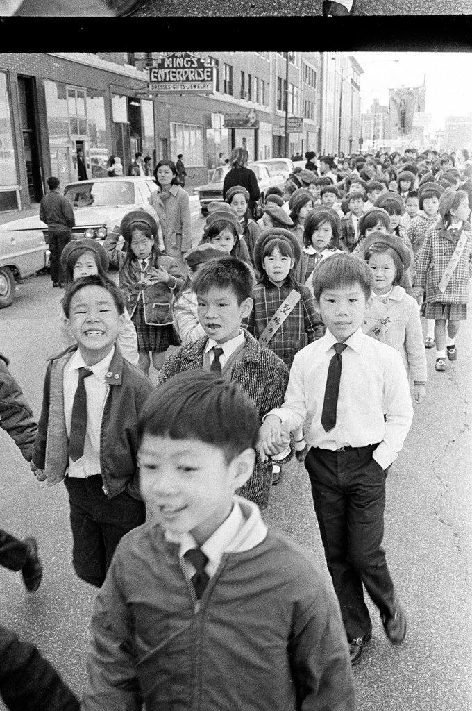 Representatives from the Chicago Chinese Community Center march through Chinatown for the Chinese Independence Day Parade - Chicago Sun-Times