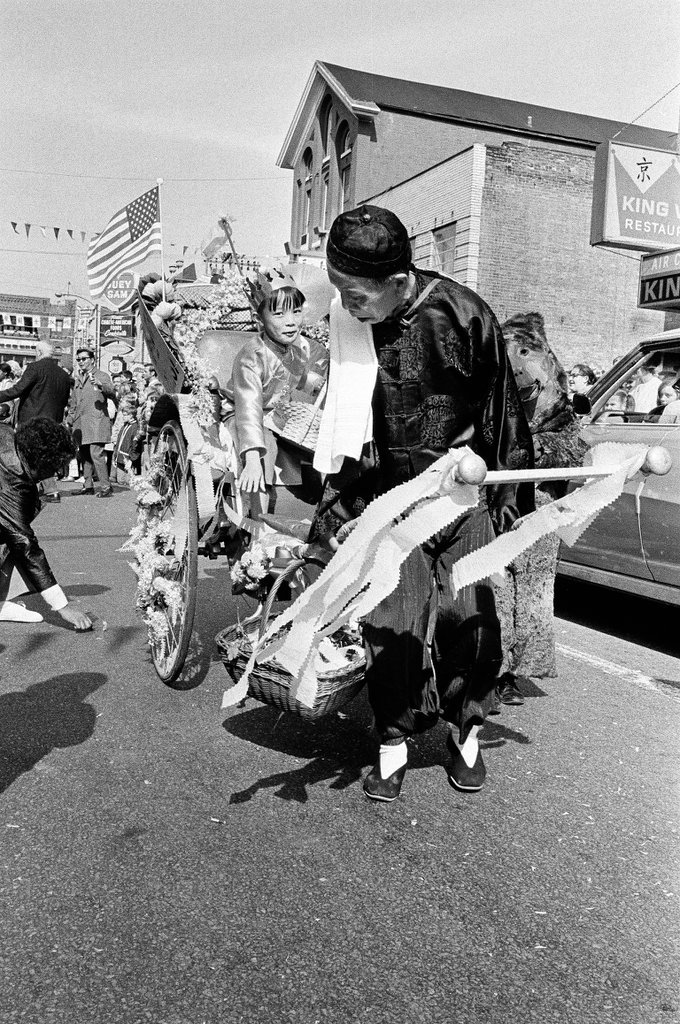 Representatives from the Chicago Chinese Community Center march through Chinatown for the Chinese Independence Day Parade - Chicago Sun-Times