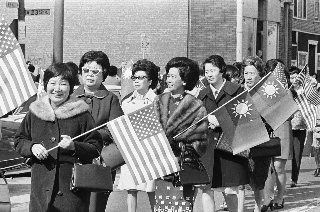 Representatives from the Chicago Chinese Community Center march through Chinatown for the Chinese Independence Day Parade - Chicago Sun-Times