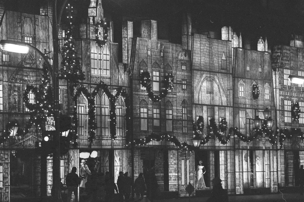 Christmas scenes and decorations lining windows on State Street - Chicago Sun-Times