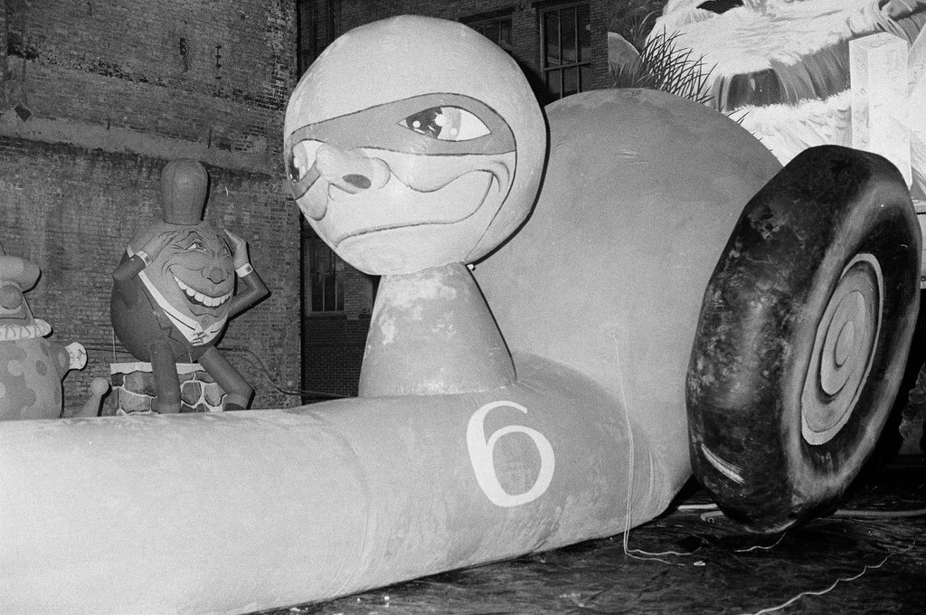 Workers inflate large balloons of characters such as Humpty Dumpty for the annual Christmas parade - Chicago Sun-Times