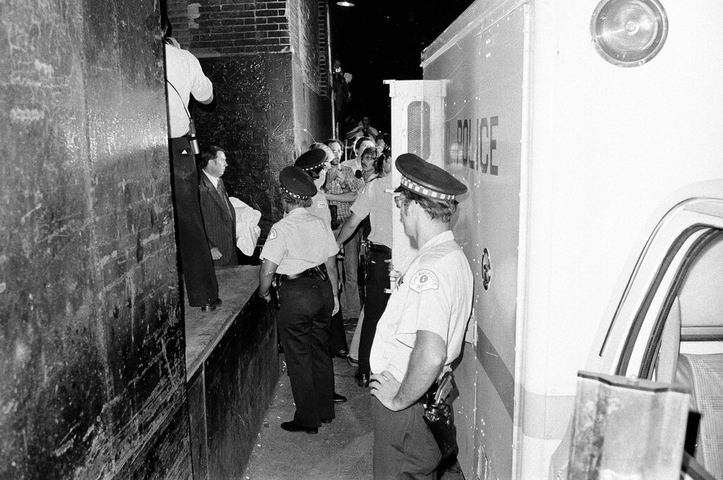 After being held hostage for ten hours, six individuals exit the West German Consulate offices - Chicago Sun-Times
