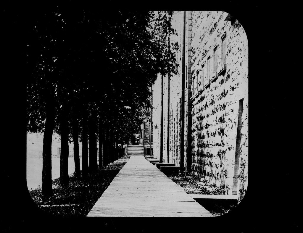 Sidewalk - by a wall - Wetmore, S. W.