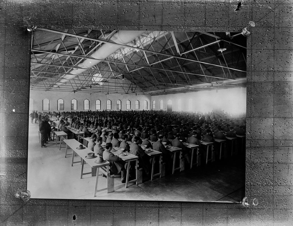 Imprisoned people in dining hall - Wetmore, S. W.