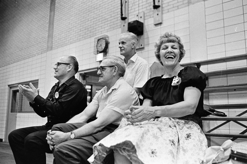 Square dancers respond to a caller's instructions at the Lawndale Park gym - Chicago Sun-Times